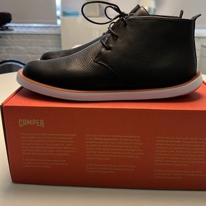 Brand-new pair of men’s Camper K300378–008, US size 7, in black. Still in box.